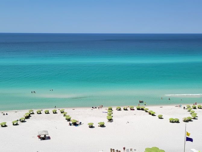 Aerial view of Miramar Beach with turquoise Gulf water
